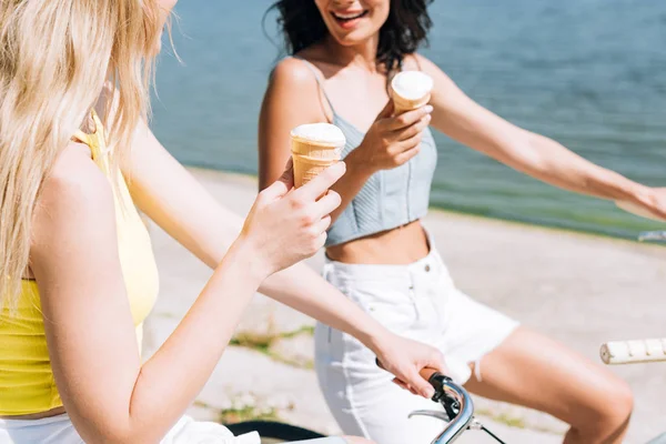 Cropped View Blonde Brunette Girls Riding Bikes Ice Cream River — Stock Photo, Image