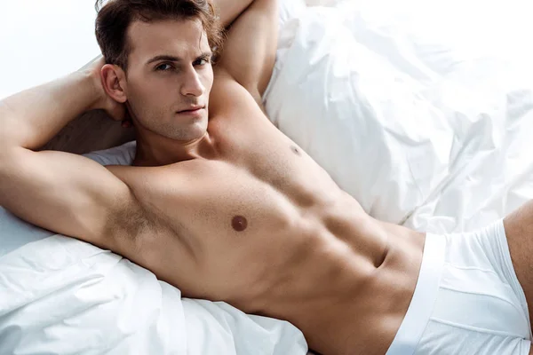 Young Sexy Man Lying Bed Looking Camera — Stock Photo, Image