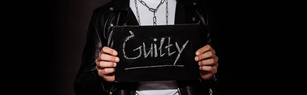 Panoramic Shot Man Holding Chalk Board Guilty Lettering Black — Stock Photo, Image