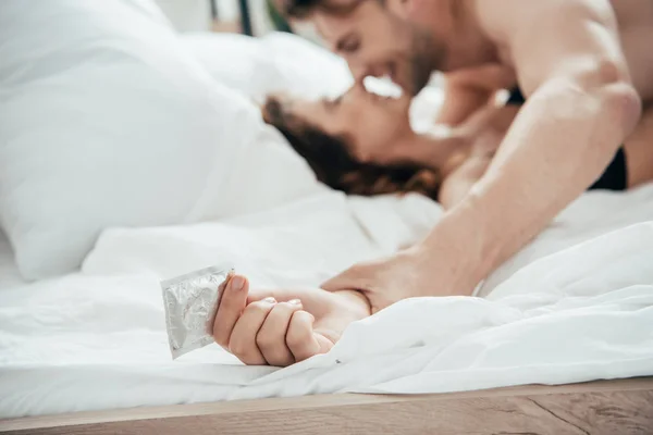 Selective Focus Woman Holding Condom Lying Bed — Stock Photo, Image