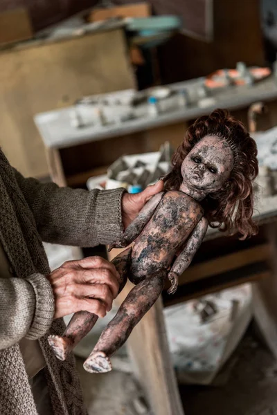 Cropped View Senior Woman Holding Dirty Baby Doll — Stock Photo, Image