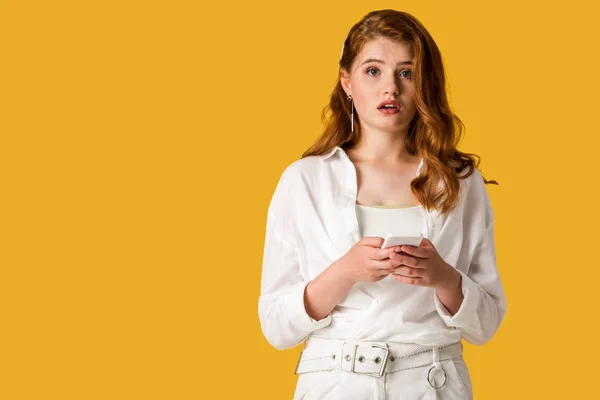 Surprised Redhead Woman Using Smartphone Isolated Orange — Stock Photo, Image