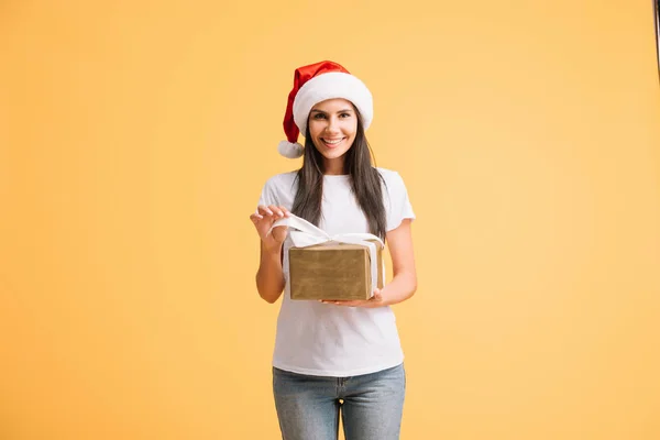 Beautiful Woman Santa Hat Holding Christmas Gift Box Isolated Yellow — Stock Photo, Image