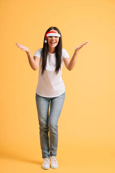 Beautiful Happy Girl White Shirt Glasses Santa Hat Isolated Yellow — Stock Photo, Image