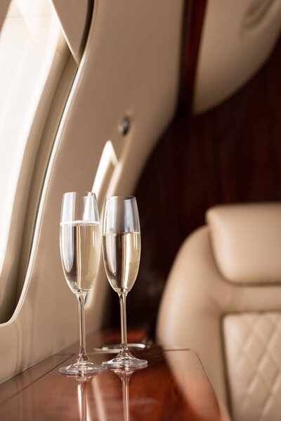 interior of plane with champagne glasses for trip