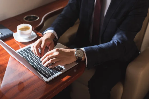 Cropped View Businessman Typing Laptop Plane Business Trip — Stock Photo, Image