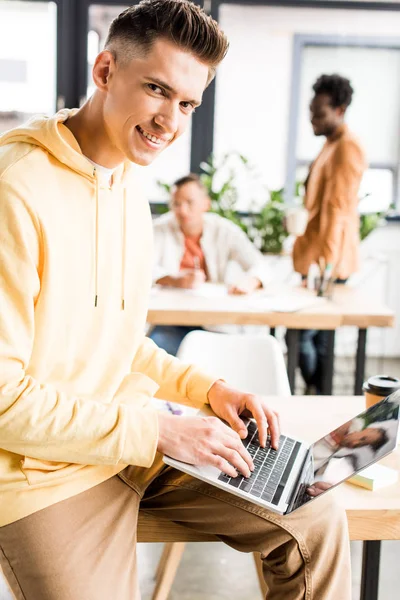 Young Smiling Businessman Looking Camera While Working Multicultural Colleagues Office — Stock Photo, Image