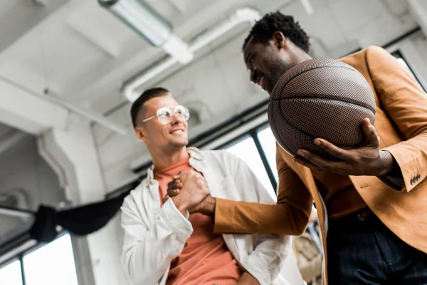 Low Angle View African American Businessman Holding Volleyball Shaking Hands — Stock Photo, Image