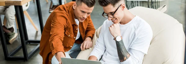 Panoramic Shot Young Businessmen Looking Laptop While Working Startup Project — Stock Photo, Image