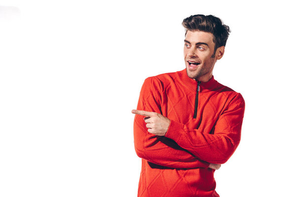 excited handsome man pointing isolated on white