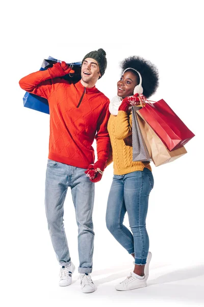 Interracial Couple Winter Sweaters Holding Shopping Bags Isolated White — Stock Photo, Image