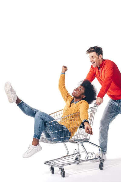 Beautiful Interracial Couple Having Fun Shopping Cart Isolated White — Stock Photo, Image