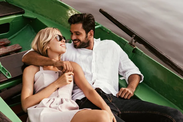 Happy Young Man Embracing Pretty Girlfriend While Sitting Boat — Stock Photo, Image