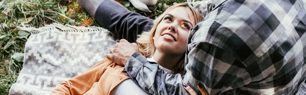 Cropped View Man Embracing Smiling Girlfriend Lying Blanket Park Panoramic — Stock Photo, Image