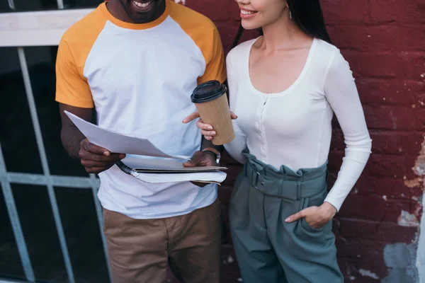 Cropped View African American Businessman Showing Documents Colleague Holding Coffee — Stock Photo, Image