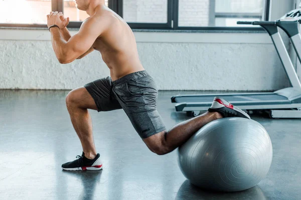 Cropped View Sportsman Doing Lunges Fitness Ball Sports Center — Stock Photo, Image