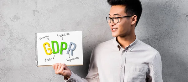Panoramic Shot Smiling Asian Businessman Holding Looking Paper Gdpr Lettering — Stock Photo, Image