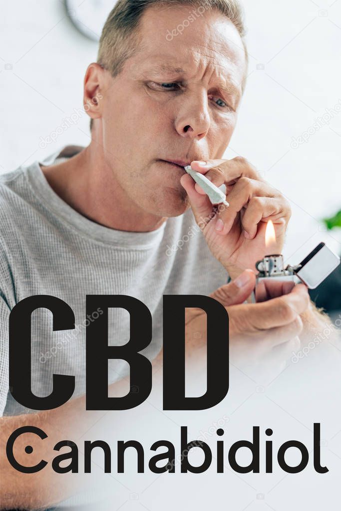 mature man lighting up blunt with medical cannabis at home near CBD illustration