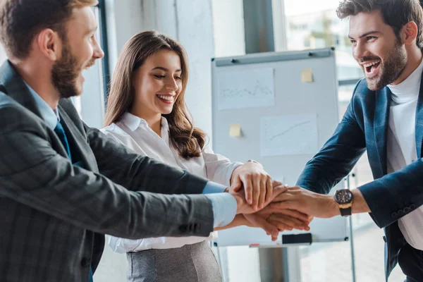 Selective Focus Happy Businessmen Businesswoman Putting Hands Together — Stock Photo, Image