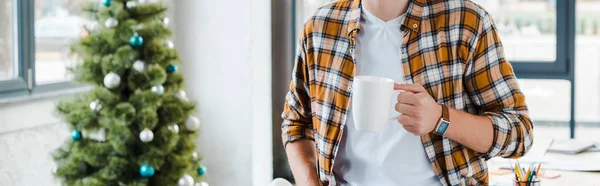 Panoramic Shot Man Holding Cup Decorated Christmas Tree — Stock Photo, Image