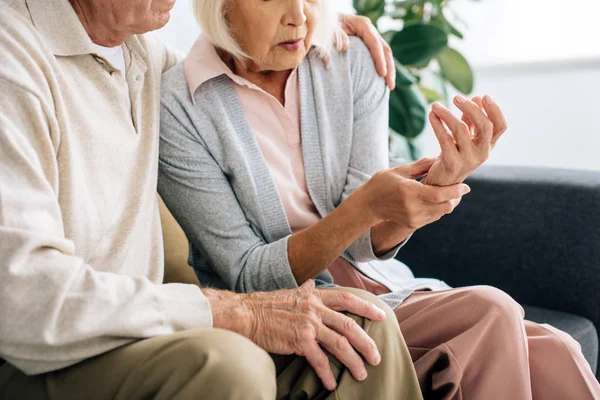 Cropped View Husband Looking Wife Pain Back Apartment — Stock Photo, Image