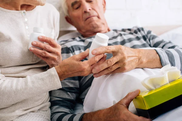 Cropped View Wife Giving Pills Ill Husband — Stock Photo, Image