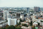 aerial view of urban city with buildings and streets