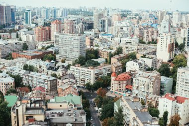 aerial view of urban city with buildings and streets clipart