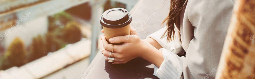 Cropped view of trendy girl in beige suit posing on roof with coffee to go — Stock Image Cropped View Trendy Girl Beige Suit Posing Roof Coffee Stock Picture