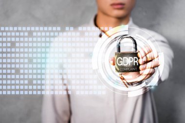 cropped view of businessman holding metal padlock with gdpr lettering and illustration  clipart