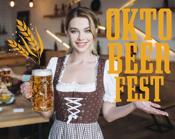 attractive waitress in german national costume holding mug of light beer and looking at camera near Oktobeerfest illustration