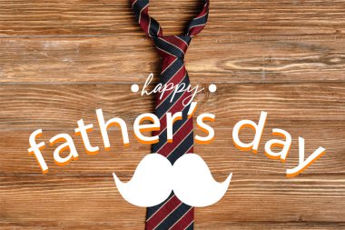Top view of mens striped fabric tie on wooden background, happy fathers day illustration clipart