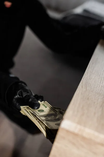 Selective Focus Robber Leather Glove Taking Dollars Table — Stock Photo, Image