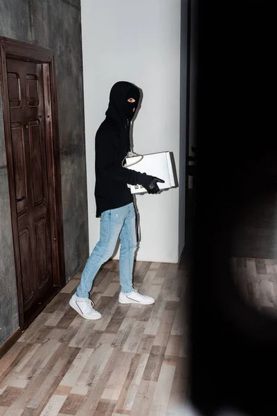 Side View Robber Holding Microwave Oven While Walking House Door — Stock Photo, Image