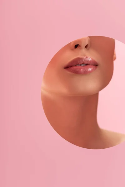 Partial View Beautiful Woman Shiny Lips Paper Hole Isolated Pink — Stock Photo, Image