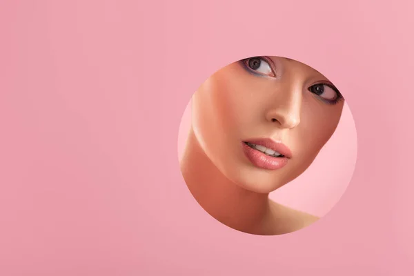 Portrait Beautiful Woman Shiny Makeup Paper Hole Isolated Pink — Stock Photo, Image