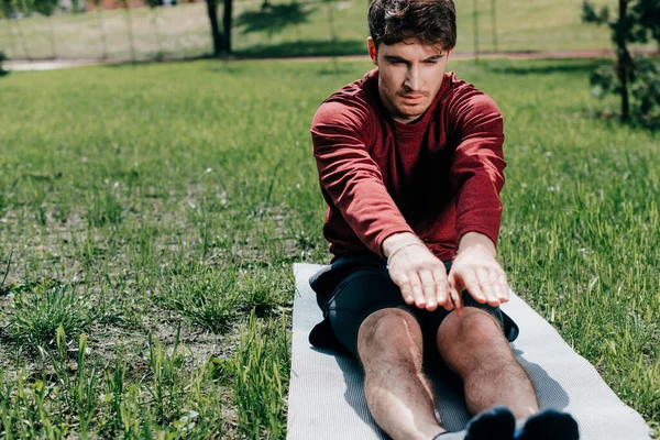 Selective Focus Handsome Man Stretching Fitness Mat Grass Park — Stock Photo, Image