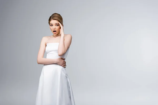 Shocked Bride Wedding Dress Looking Camera Touching Face Isolated Grey — Stock Photo, Image