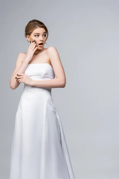 Shocked Bride Wedding Dress Looking Away Touching Face Isolated Grey — Stock Photo, Image