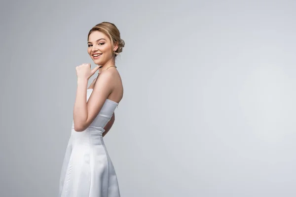 Happy Girl White Wedding Dress Pointing Thumb Isolated Grey — Stock Photo, Image