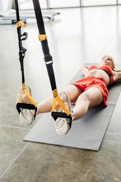 Selective Focus Athletic Woman Sportswear Exercising Resistance Bands While Lying — Stock Photo, Image