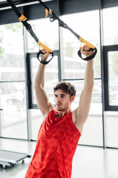 Handsome Strong Sportsman Working Out Elastics Gym — Stock Photo, Image