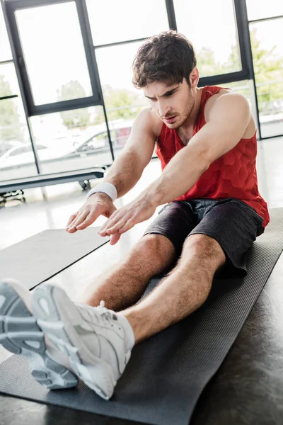 Selective Focus Handsome Sportsman Stretching Fitness Mat — Stock Photo, Image