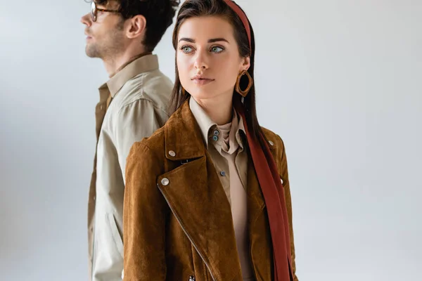 Young Fashionable Couple Looking Away While Posing Isolated Grey — Stock Photo, Image