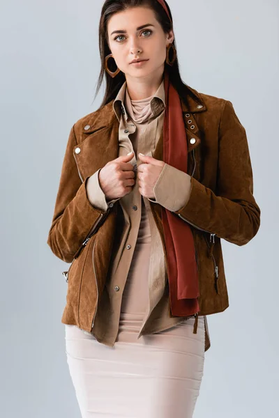 Confident Stylish Girl Touching Suede Jacket While Looking Camera Isolated — Stock Photo, Image