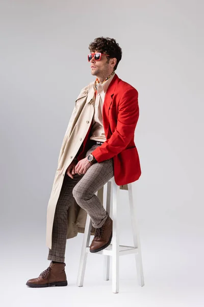 Handsome Stylish Man Trench Coat Shoulder Sitting Stool Looking Away — Stock Photo, Image