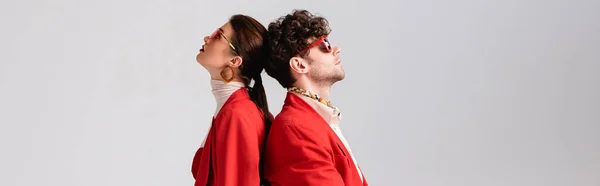 Panoramic Shot Trendy Couple Red Blazers Sunglasses Standing Back Back — Stock Photo, Image