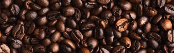top view of fresh roasted coffee beans background, panoramic shot