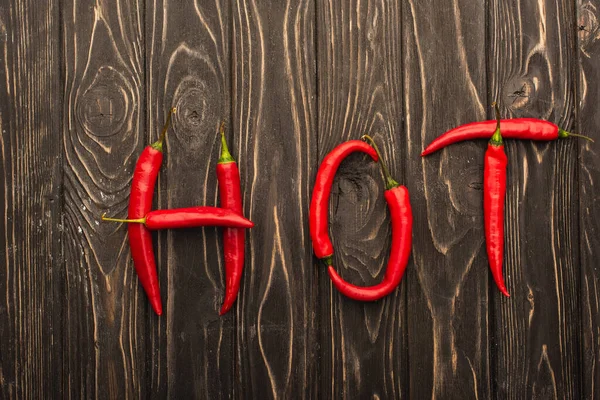 Top View Word Hot Made Chili Peppers Wooden Surface — Stock Photo, Image