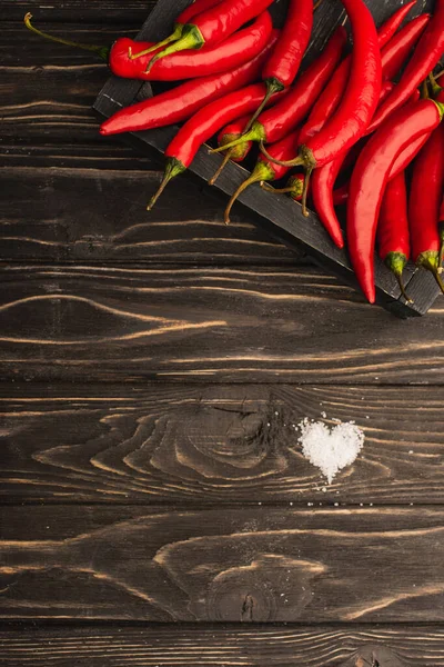 Top View Chili Peppers Box Salt Heart Wooden Surface — Stock Photo, Image